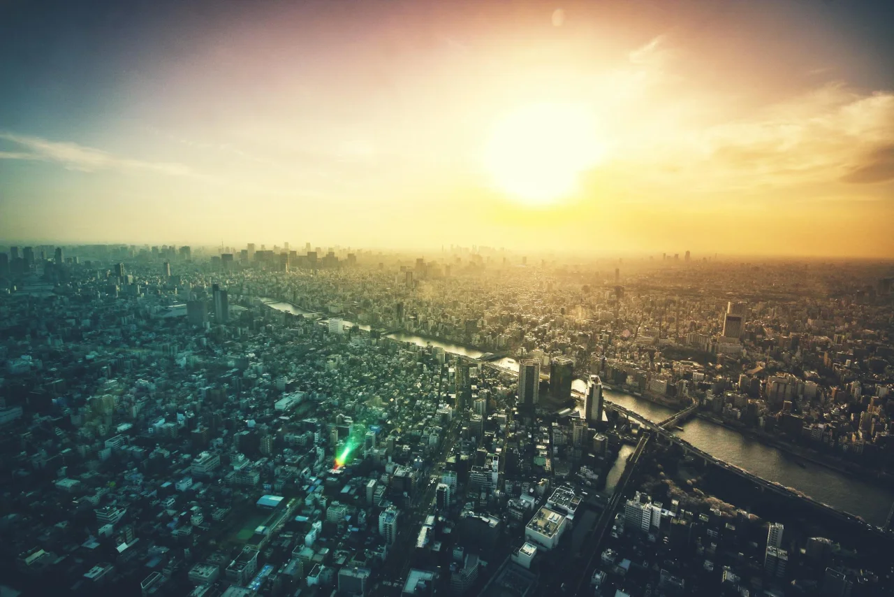 Metropolitan sprawl at golden hour, indicating systemic complexity across strategic fronts.